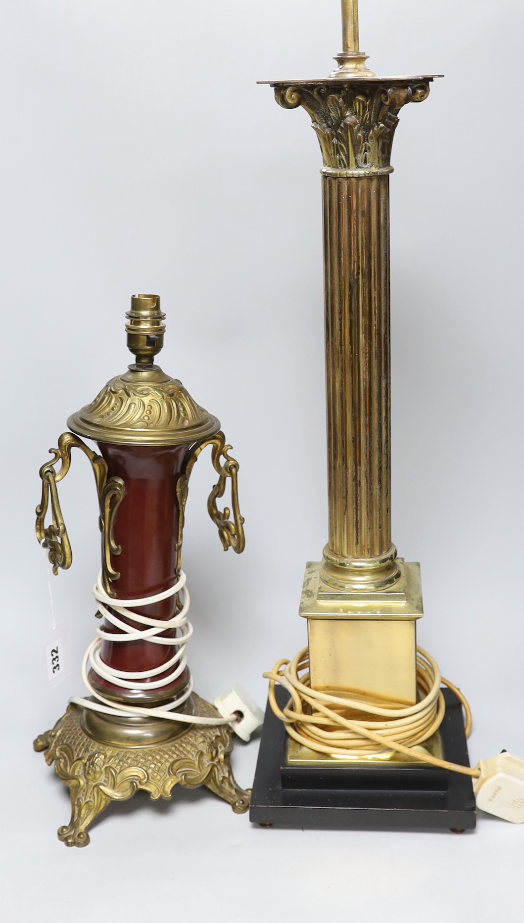 A Corinthian column lamp base and a two handled brass lamp base, tallest 60cms excluding light fitting